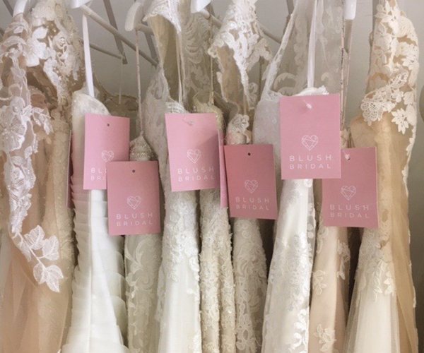 Blush Bridal gowns in a row